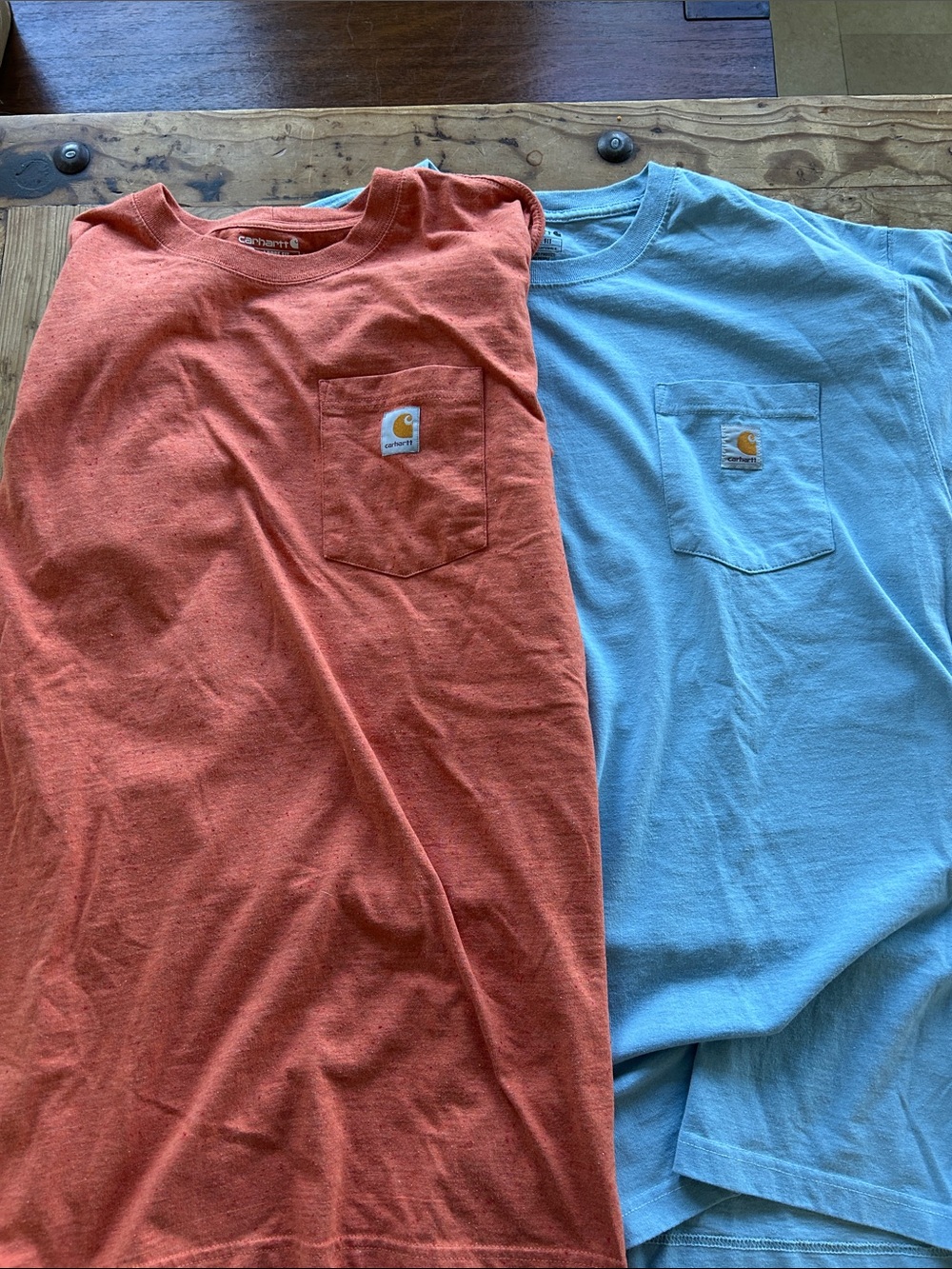 Two Men’s XL Carhartt Short-Sleeve Pocket Tees in Orange and Light Blue - 2-Pack
